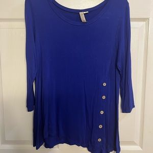 Tunic type top in perfect condition
